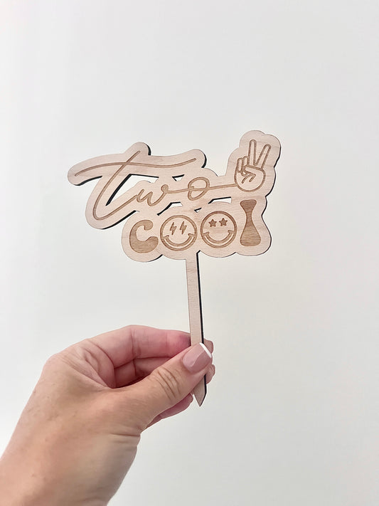 Two cool cake topper