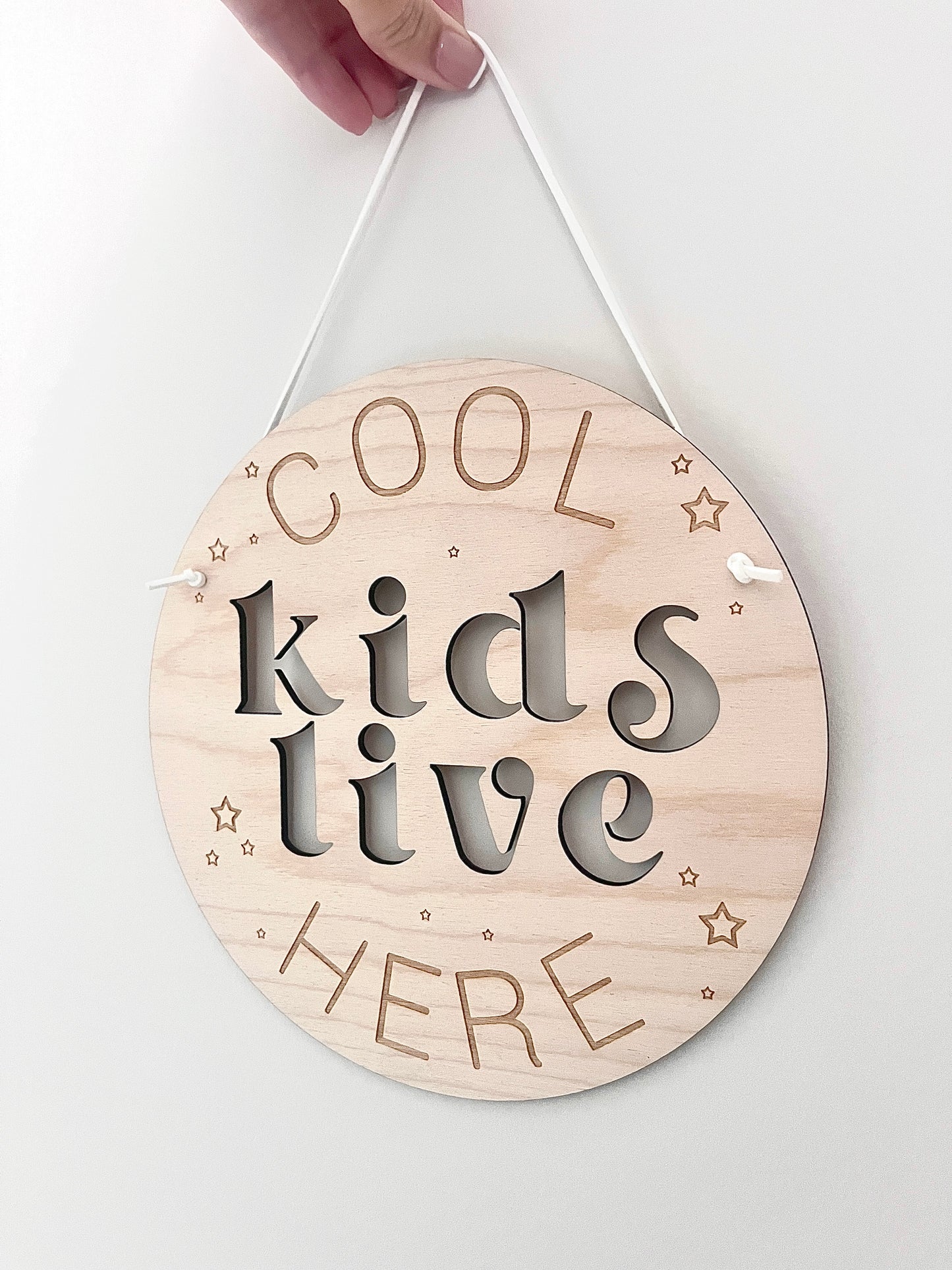 Cool kids live here sign